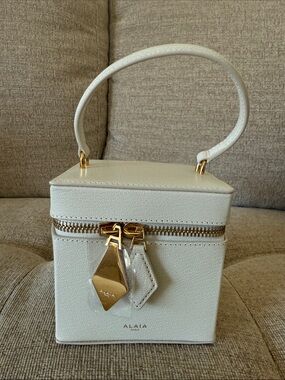 Brand New Authentic Alaïa Ivory Leather Mini Vanity Bag with Gold Hardware